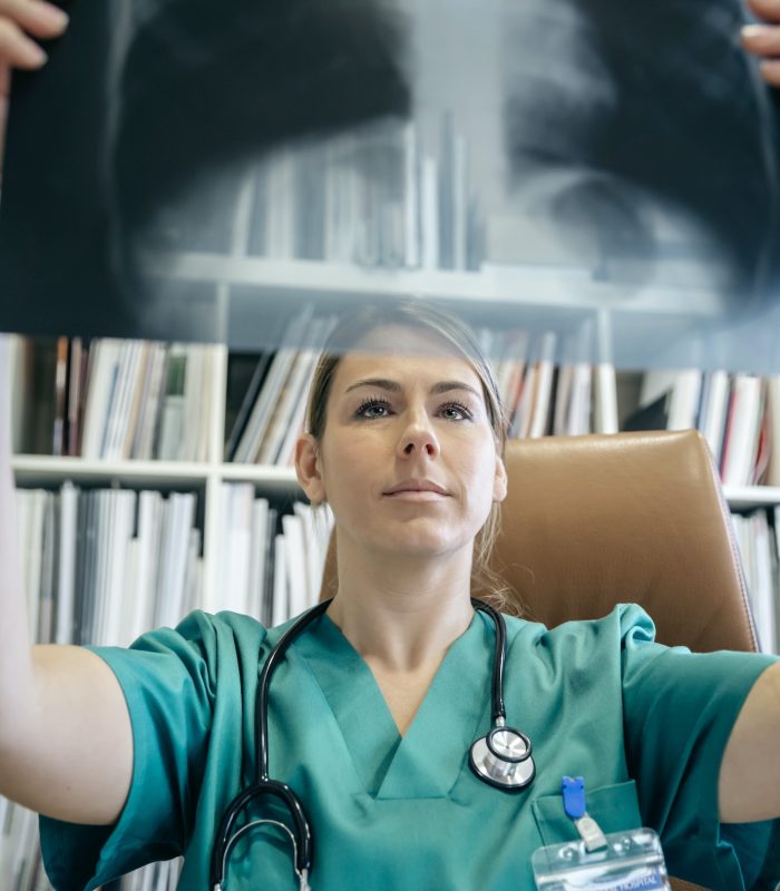 Doctor looking at x-ray image